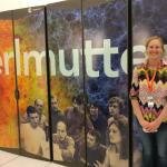 Laurie in front of NERSC's Perlmutter system
