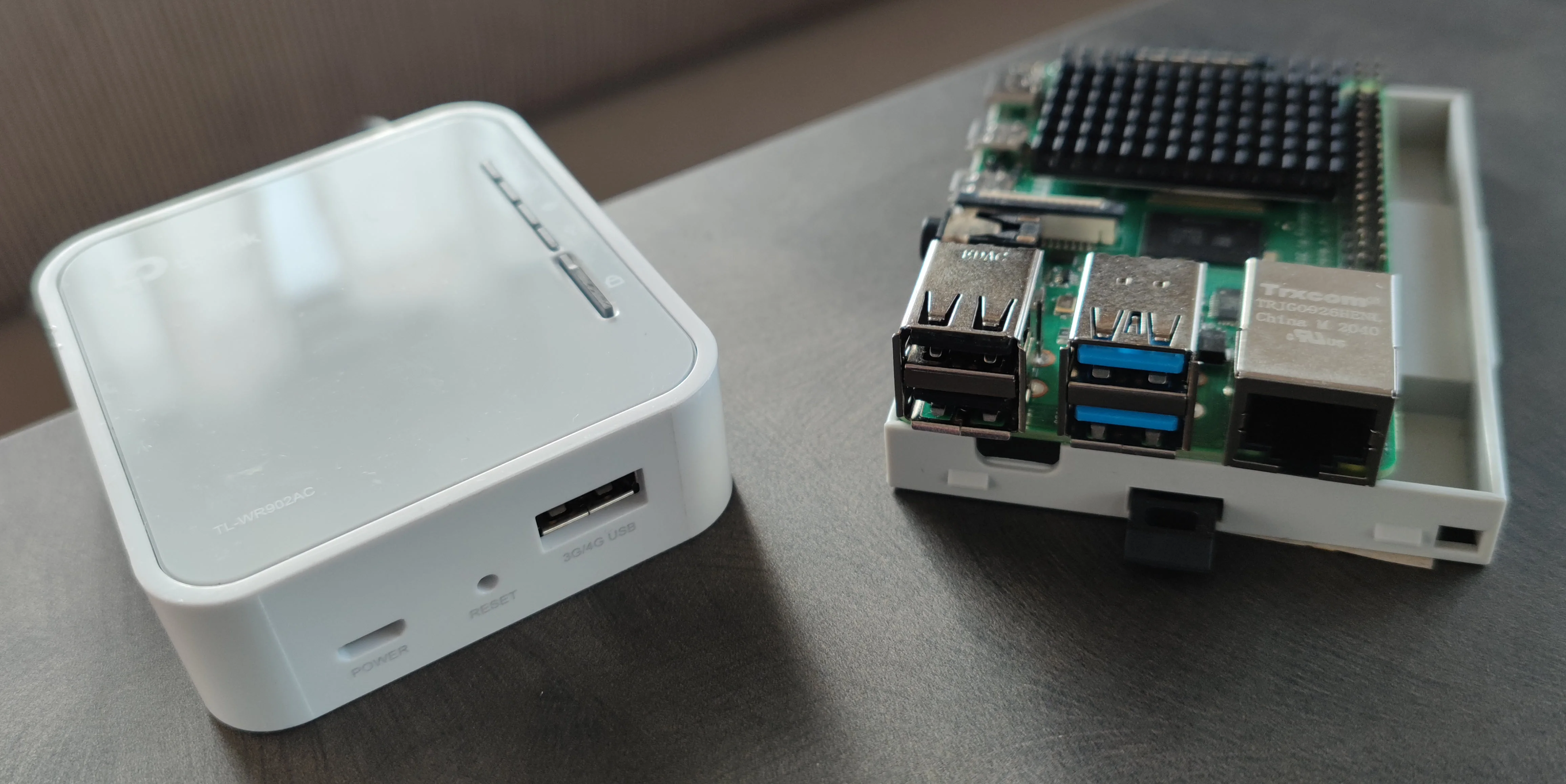 TP-Link TL-WR902AC next to a Raspberry Pi