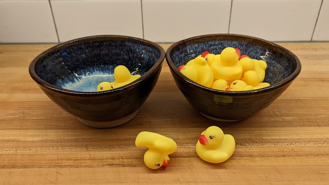 Image of rubber ducks in two bowls