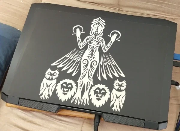 Sallie Goetsch's laptop with a custom goddess Ereshkigal skin