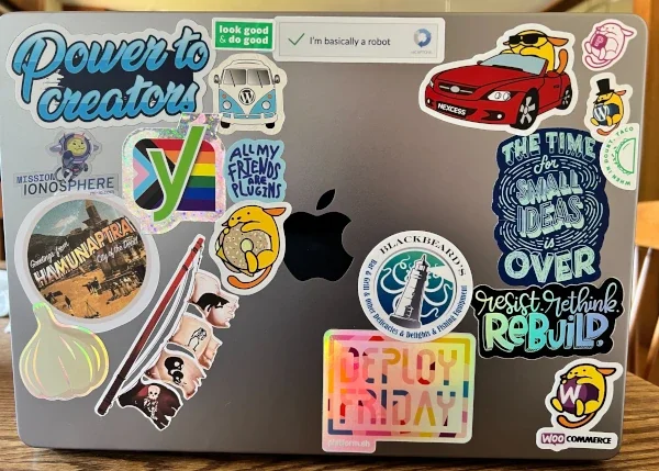 Tiffany Bridge's laptop with movie, WordPress, and garlic decals