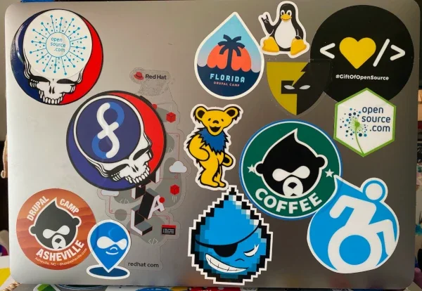 AMyJune's laptop with lots of Drupal stickers