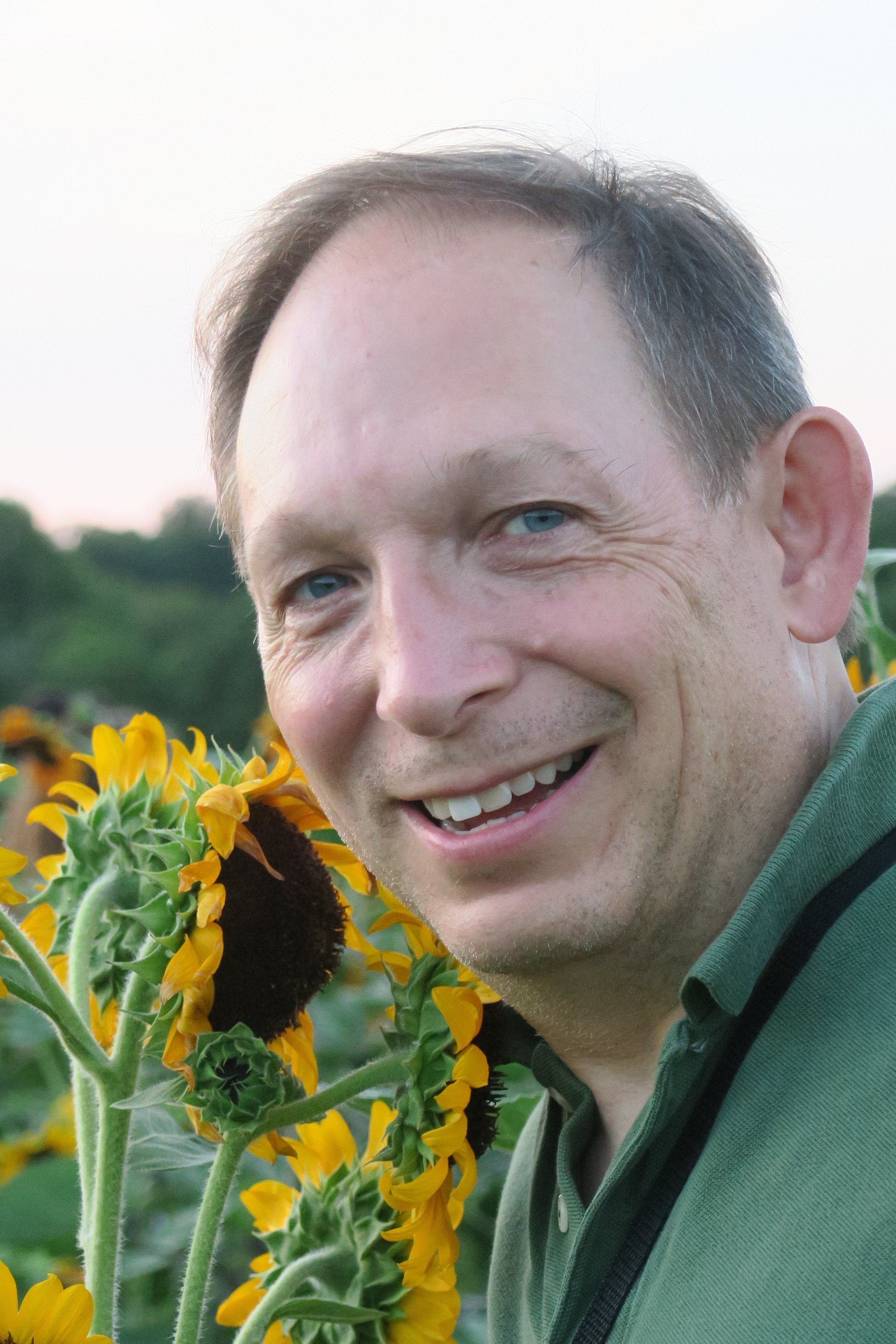 Will Cohen with sunflowers