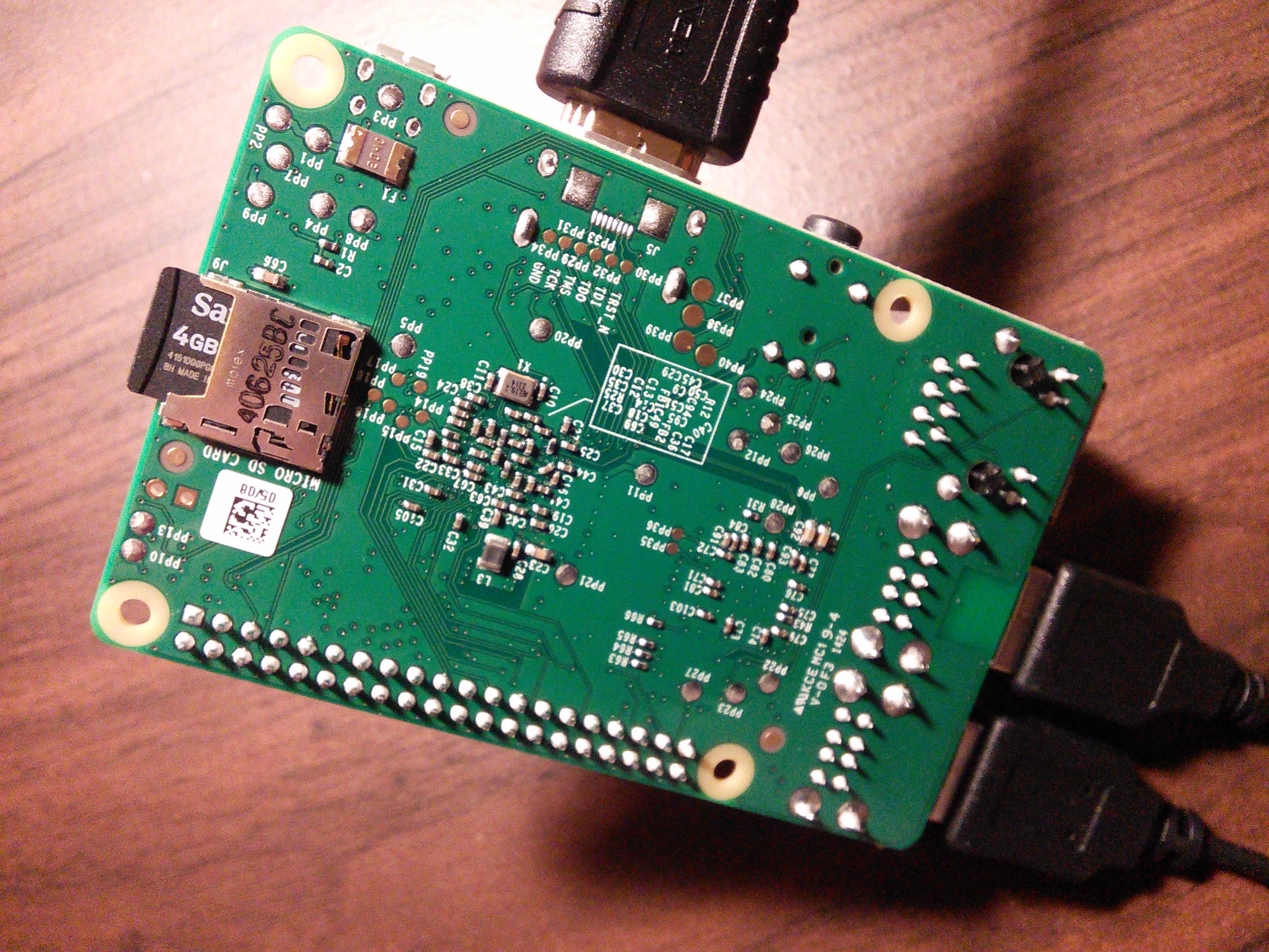Picture of the back of the Raspberry Pi B+ board showing the microSD card