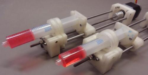 Double-pump syringe