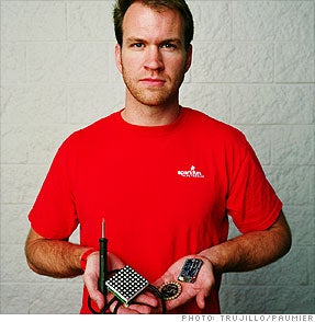 Nathan Seidle holding open hardware, CEO of SparkFun