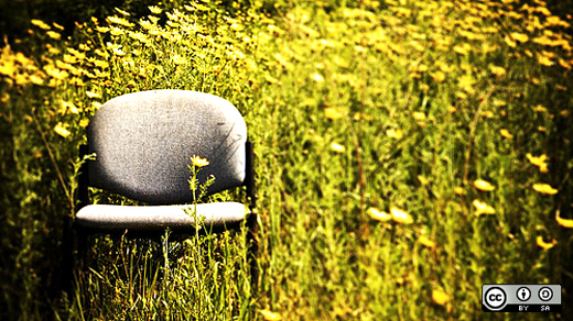 A chair in a field.