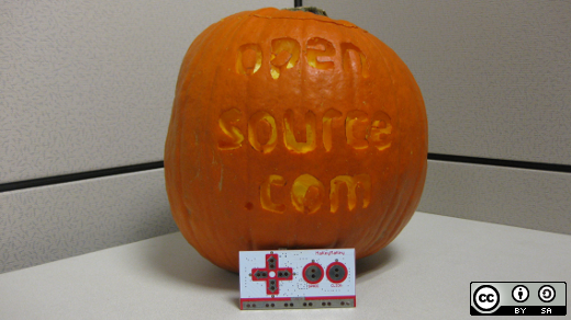 Pumpkin carved with Opensource.com logo