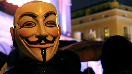 anonymous mask in a crowd