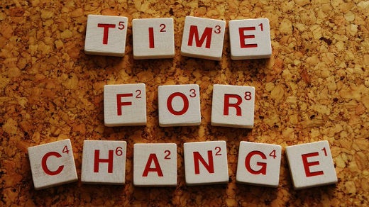 scrabble letters: "time for change"