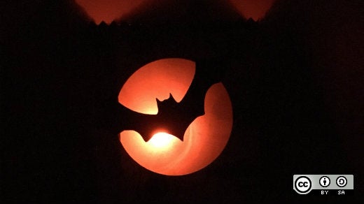 Halloween - backlit bat flying