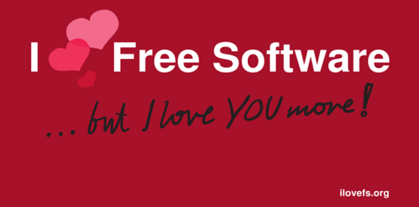 Red postcard that says I heart free software, but I love you more!