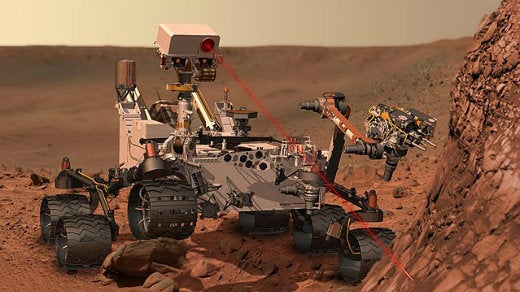 Artist's conception of the Curiosity rover vaporizing rock on Mars