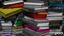 A pile of books in different colors