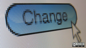 An arrow clicking a change button