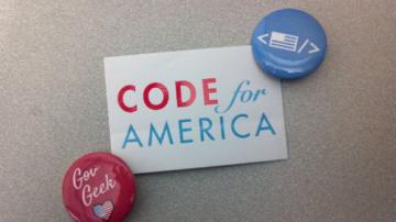 Code for America sickers and pins.
