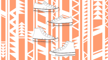 White shoes on top of an orange tribal pattern
