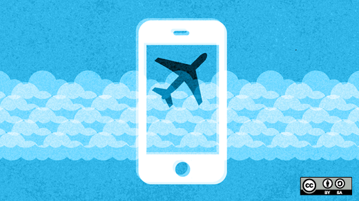 mobile phone with plane symbol on it and blue cloud background