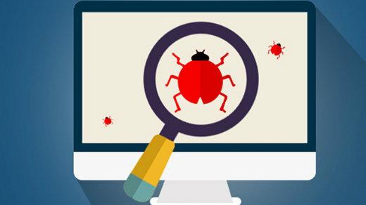 Bug tracking magnifying glass on computer screen