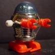 A small wind-up robot toy