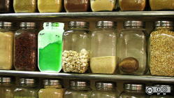 Jars with food inside on a shelf