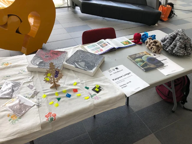 Various art pieces, including 3D-printed earrings by Karynne Ledger and crochet coral by Rachel Bunder