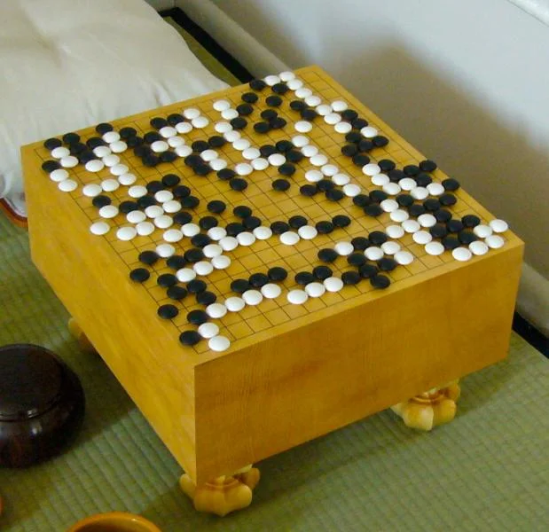 Floor goban with a game in progress