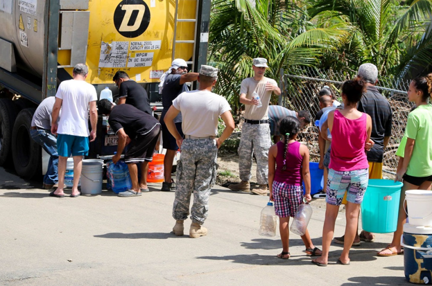 Puerto Rico National Guard soldiers distributing water in San Jose